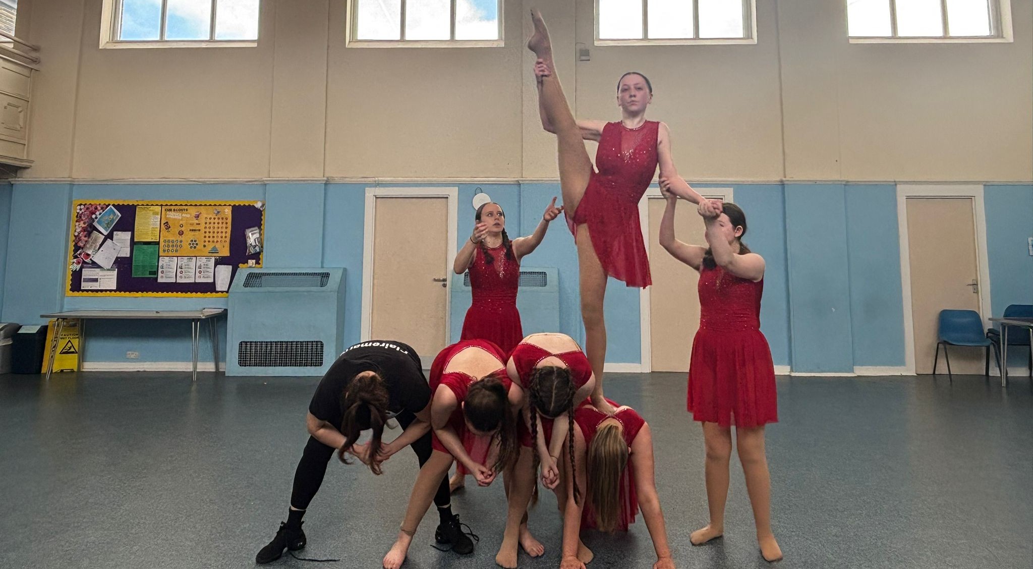 Cheer dance students mid-routine at Bradford theatre show