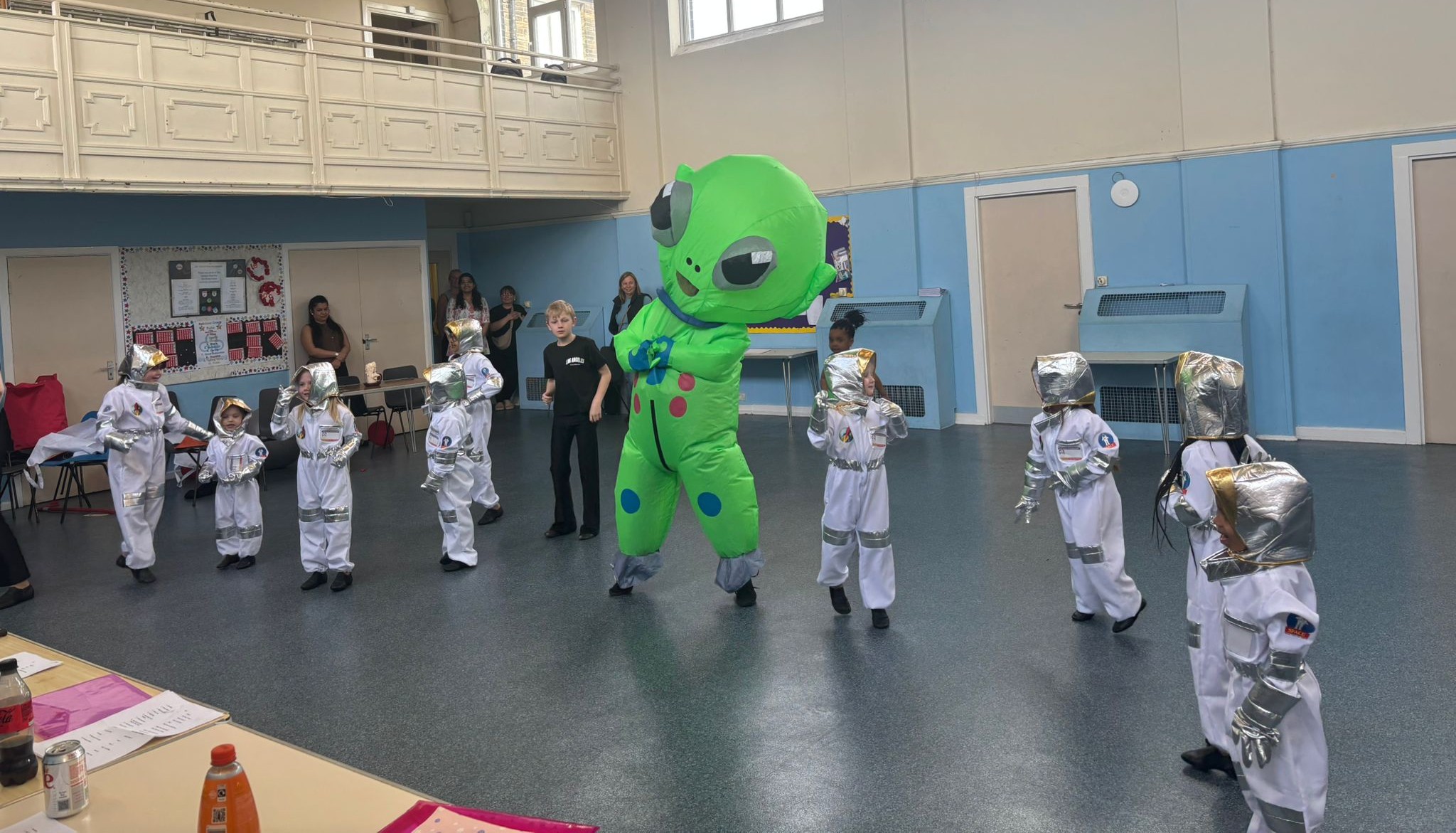 Smiling dancers on stage during show in Bradford